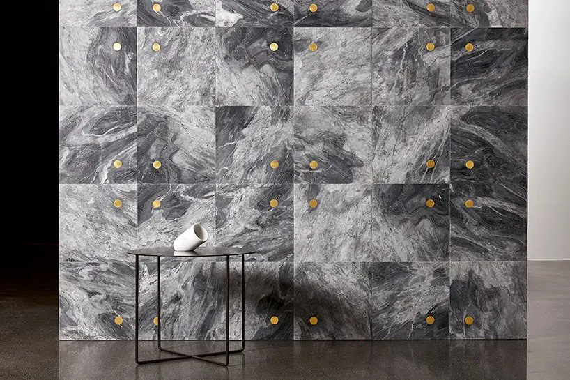 wall&floors- ‘punto’ wall covering with inlays in brass by andrea maffei architects